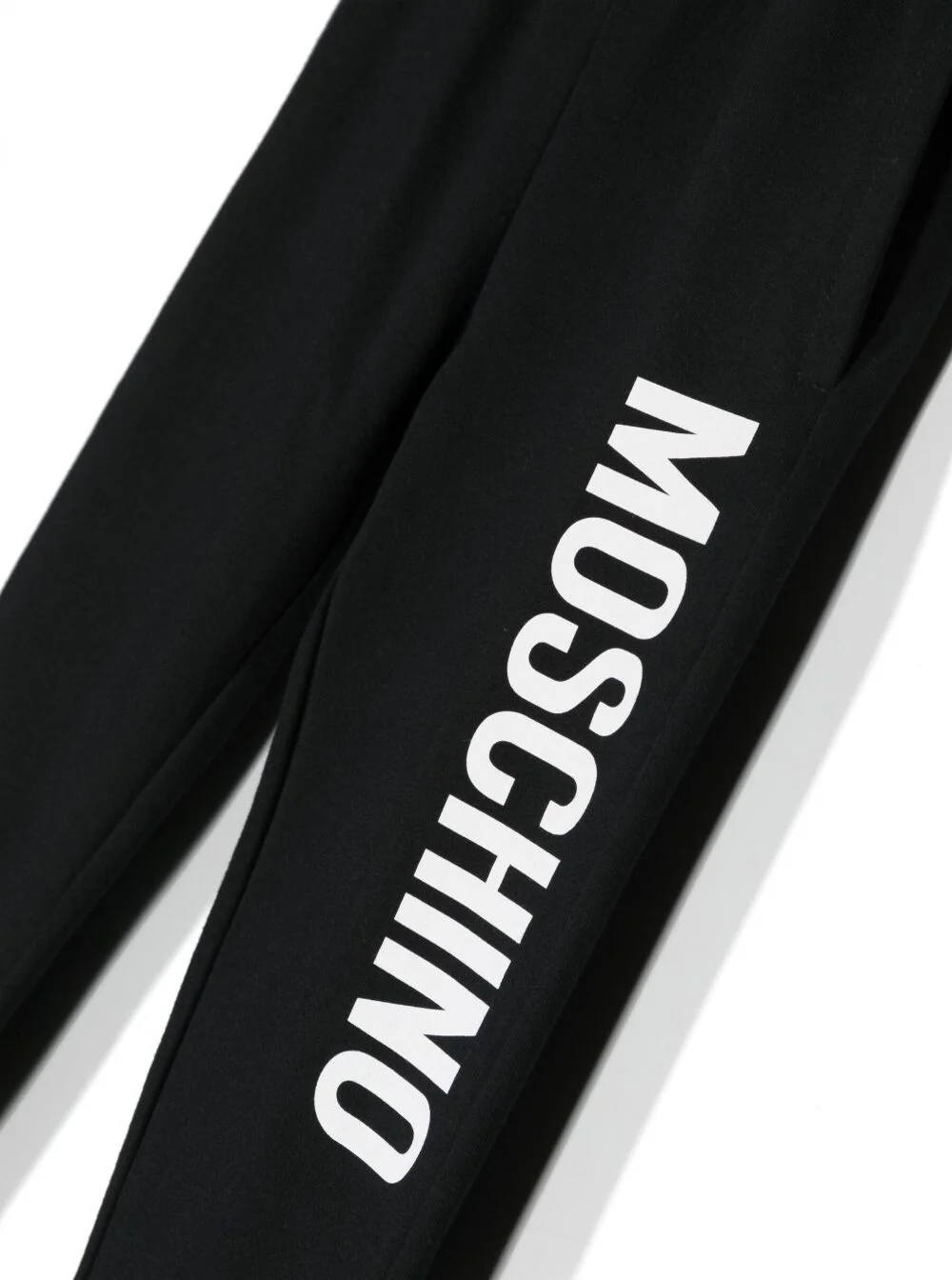 Moschino Kids Black Track Pants And Contrasting Maxi Logo Stretch Cotton Boy Elastane Trousers Moschino Kids Black Track Pants And Contrasting Maxi Logo Stretch Cotton Boy Elastane Trousers