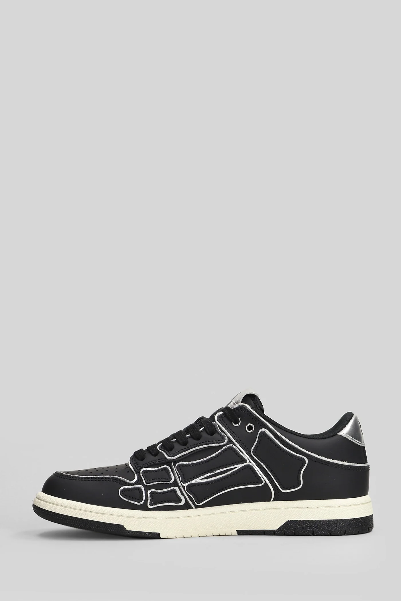 Amiri Skel top low Sneakers in black leather Scarpe